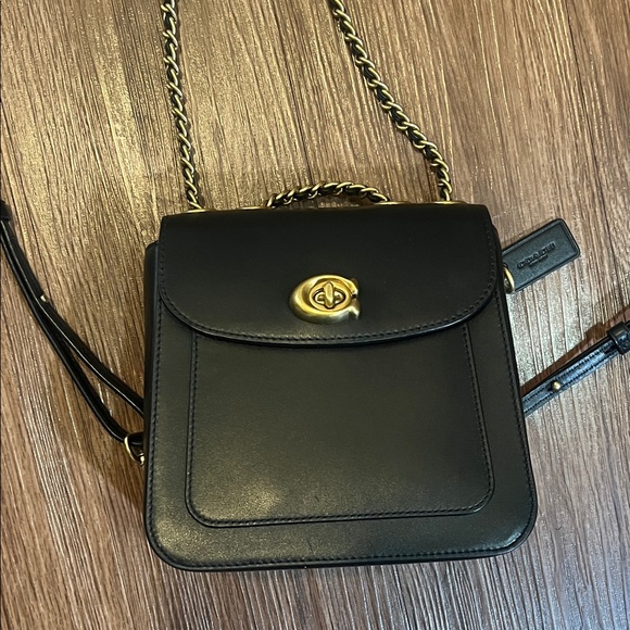 Coach Handbags - Coach Black Crossbody Bag with Gold Accents